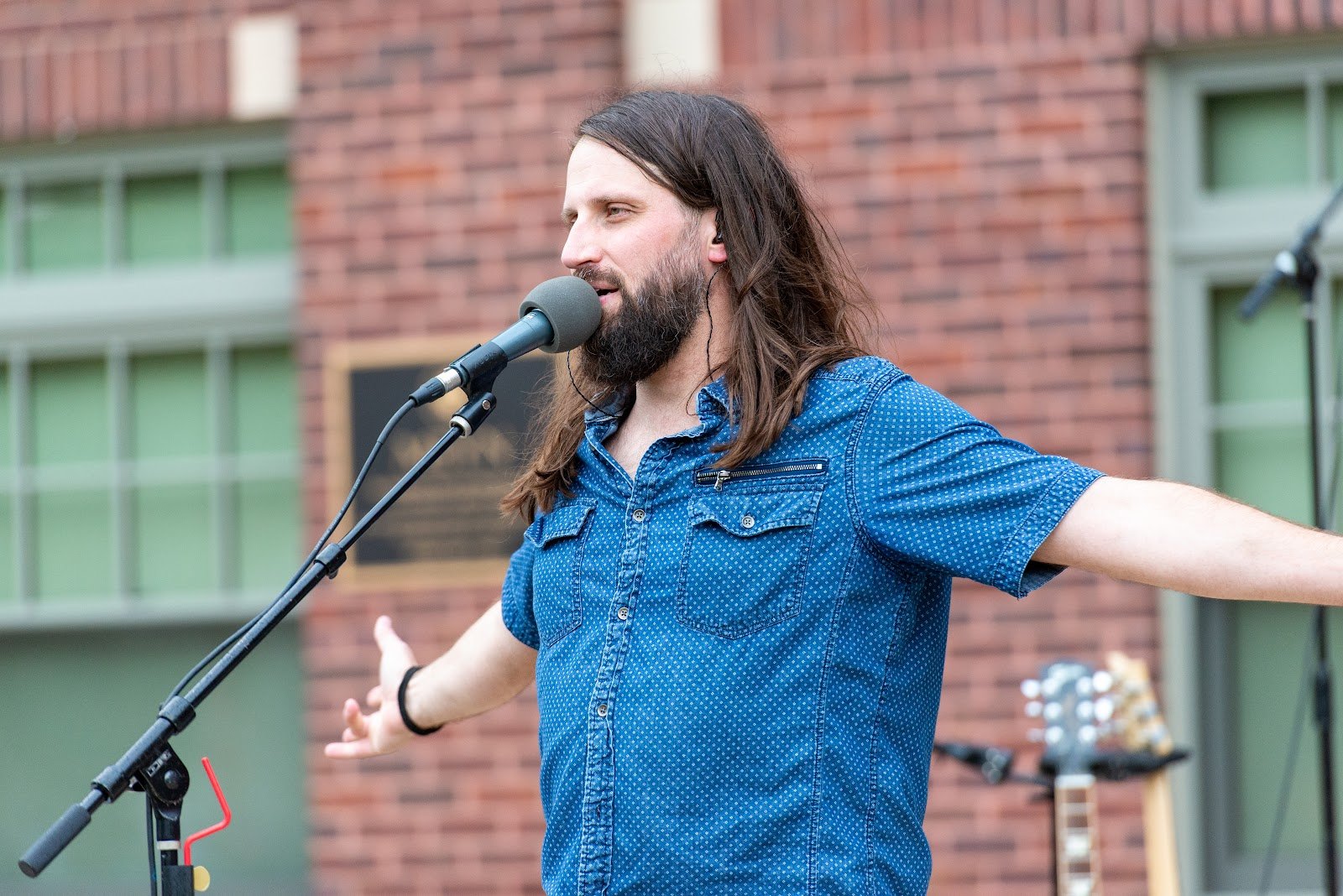 Jonny singing during Turning Down Today's Mount Prospect show