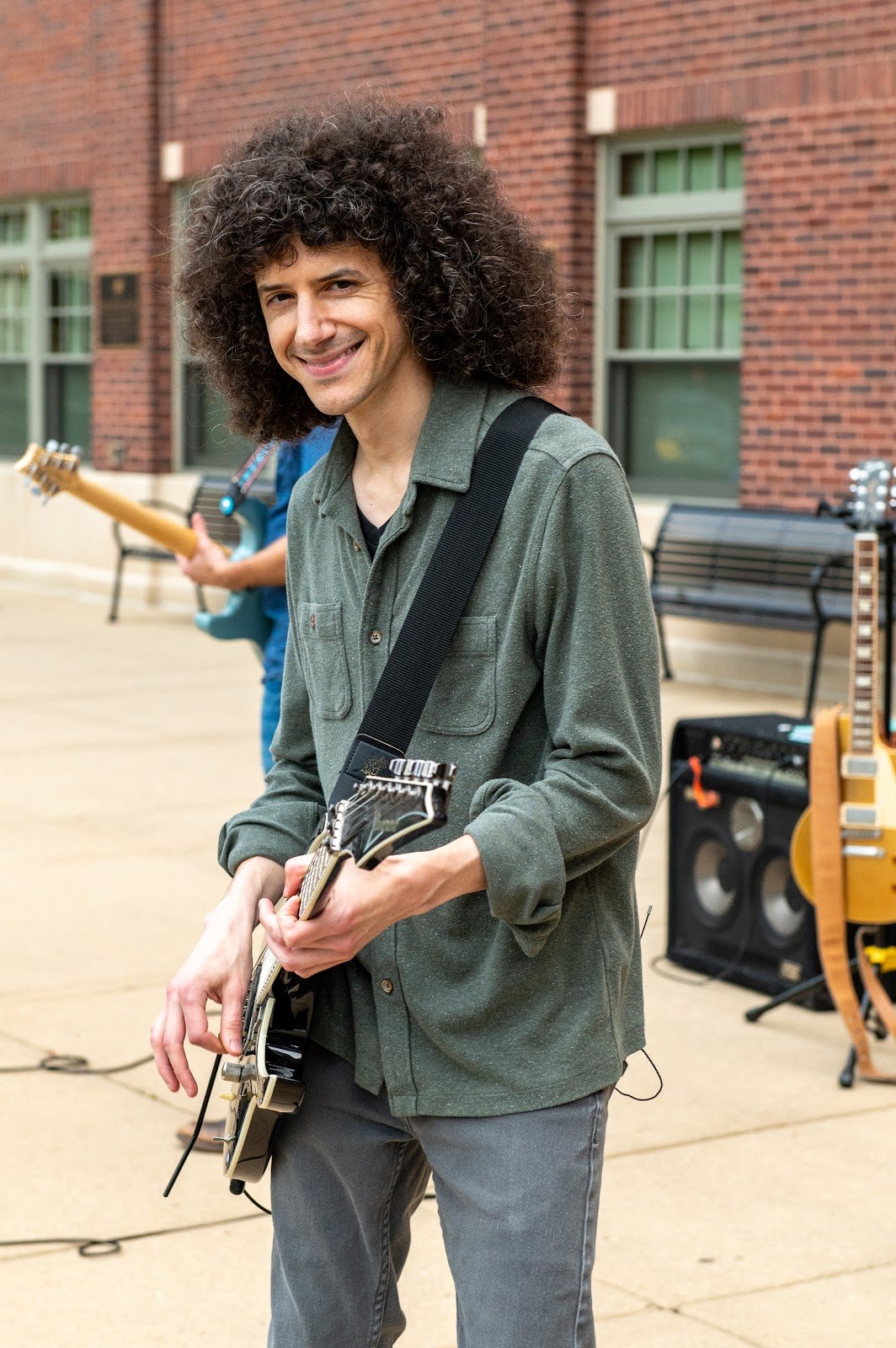 Richie playing guitar during Turning Down Today's Mount Prospect show