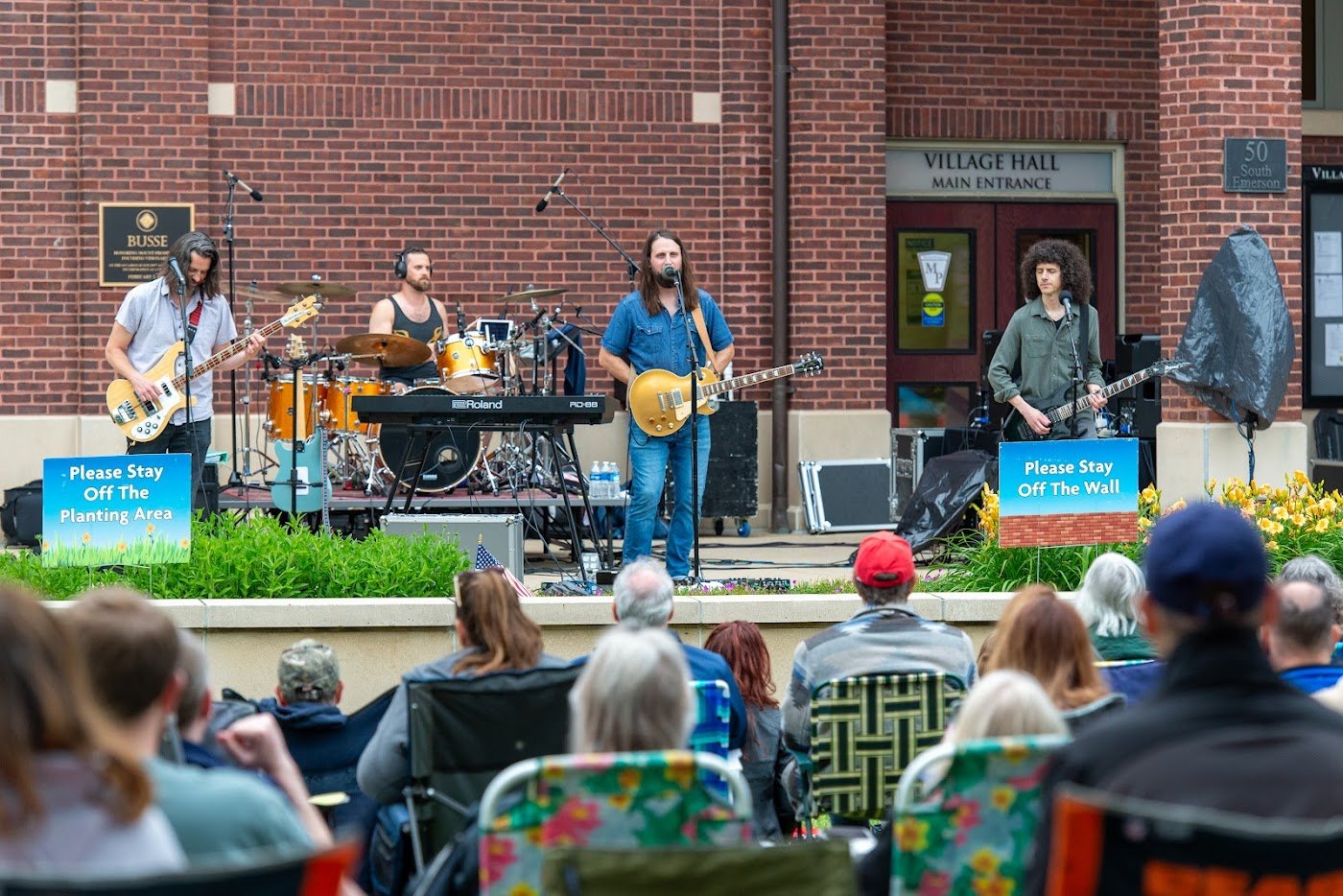 Turning Down Today performing at Centennial Green with the Mount Prospect audience in front of the stage